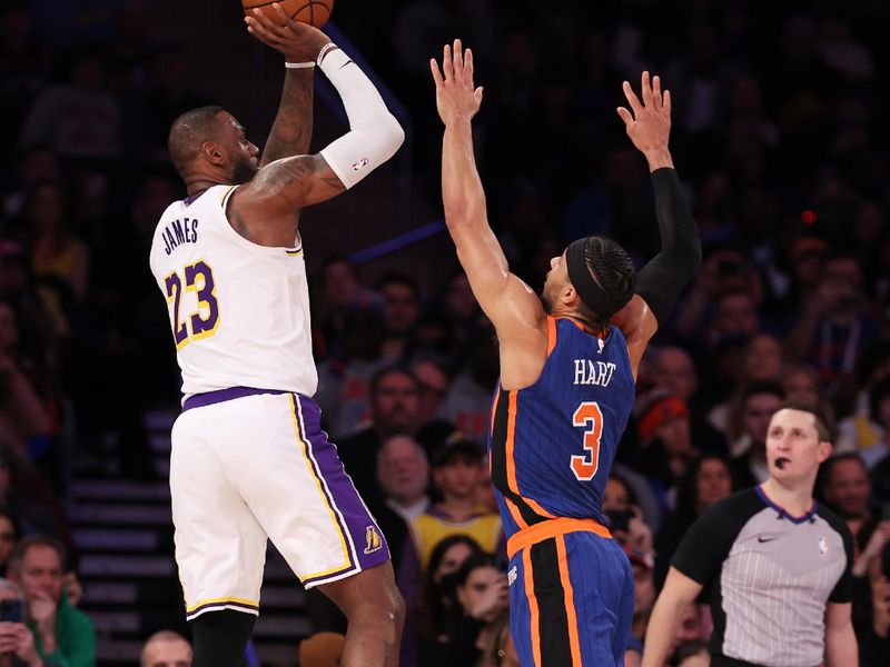 NEW YORK, NEW YORK - FEBRUARY 03:  LeBron James #23 of the Los Angeles Lakers shoots against Josh Hart #3 of the New York Knicks during their game at Madison Square Garden on February 03, 2024 in New York City.   User expressly acknowledges and agrees that, by downloading and or using this photograph, User is consenting to the terms and conditions of the Getty Images License Agreement.  (Photo by Al Bello/Getty Images)