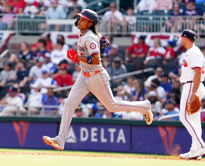 May 27, 2024; Cumberland, Georgia, USA; Washington Nationals shortstop CJ Abrams (5) trots the bases after his solo home against the Atlanta Braves during the second inning at Truist Park. Mandatory Credit: John David Mercer-USA TODAY Sports