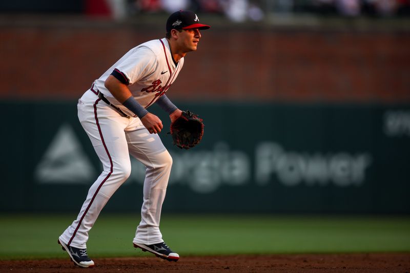Jun 3, 2025; Atlanta, Georgia, USA; Atlanta Braves third baseman Austin Riley (27) in the field against the Arizona Diamondbacks in the third inning at Truist Park. Mandatory Credit: Brett Davis-Imagn Images
