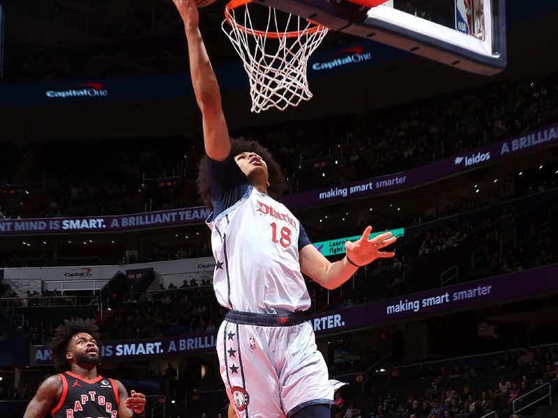 WASHINGTON, DC -?JANUARY 29: Kyshawn George #18 of the Washington Wizards drives to the basket during the game against the Toronto Raptors on January 29, 2025 at Capital One Arena in Washington, DC. NOTE TO USER: User expressly acknowledges and agrees that, by downloading and or using this Photograph, user is consenting to the terms and conditions of the Getty Images License Agreement. Mandatory Copyright Notice: Copyright 2025 NBAE (Photo by Kenny Giarla/NBAE via Getty Images)