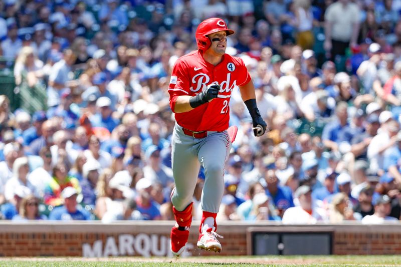 Jun 2, 2024; Chicago, Illinois, USA; 
Cincinnati Reds outfielder TJ Friedl (29) rounds the bases after hitting a three-run home run against the Chicago Cubs during the second inning at Wrigley Field. Mandatory Credit: Kamil Krzaczynski-USA TODAY Sports