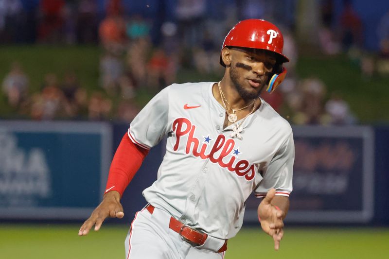 Mar 15, 2024; West Palm Beach, Florida, USA; Philadelphia Phillies center fielder Johan Rojas (18) runs toward third base and would eventually score during the sixth inning against the Houston Astros at The Ballpark of the Palm Beaches. Mandatory Credit: Reinhold Matay-USA TODAY Sports