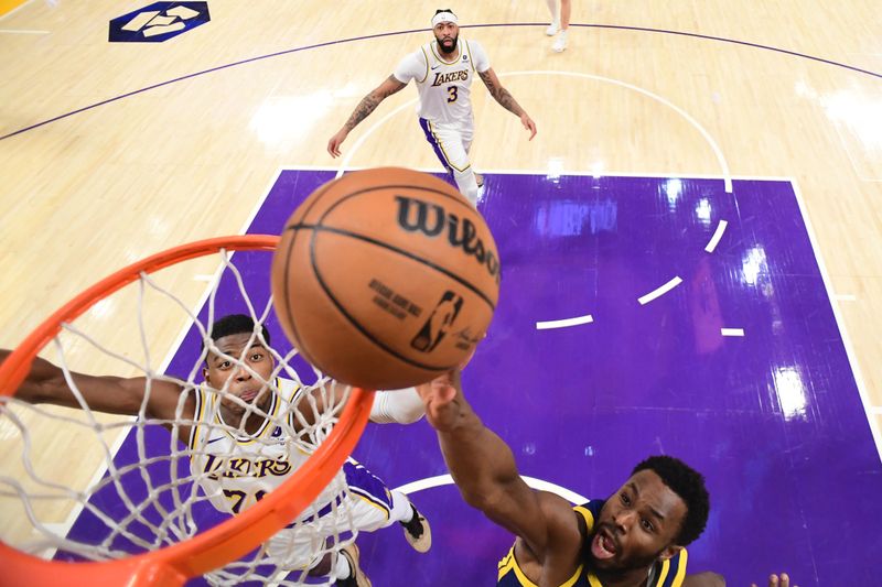 LOS ANGELES, CA - MACH 16: Andrew Wiggins #22 of the Golden State Warriors drives to the basket during the game against the Los Angeles Lakers on March 16, 2024 at Crypto.Com Arena in Los Angeles, California. NOTE TO USER: User expressly acknowledges and agrees that, by downloading and/or using this Photograph, user is consenting to the terms and conditions of the Getty Images License Agreement. Mandatory Copyright Notice: Copyright 2024 NBAE (Photo by Adam Pantozzi/NBAE via Getty Images)