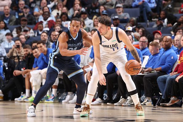 MEMPHIS, TN - DECEMBER 11: Luka Doncic #77 of the Dallas Mavericks handles the ball during the game against the Memphis Grizzlies on December 11, 2023 at FedExForum in Memphis, Tennessee. NOTE TO USER: User expressly acknowledges and agrees that, by downloading and or using this photograph, User is consenting to the terms and conditions of the Getty Images License Agreement. Mandatory Copyright Notice: Copyright 2023 NBAE (Photo by Joe Murphy/NBAE via Getty Images)