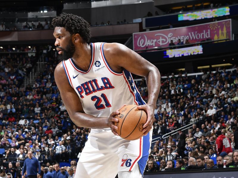 ORLANDO, FL - JANUARY 19: Joel Embiid #21 of the Philadelphia 76ers handles the ball during the game against the Orlando Magic on January 19, 2024 at the Kia Center in Orlando, Florida. NOTE TO USER: User expressly acknowledges and agrees that, by downloading and or using this photograph, User is consenting to the terms and conditions of the Getty Images License Agreement. Mandatory Copyright Notice: Copyright 2024 NBAE (Photo by Fernando Medina/NBAE via Getty Images)