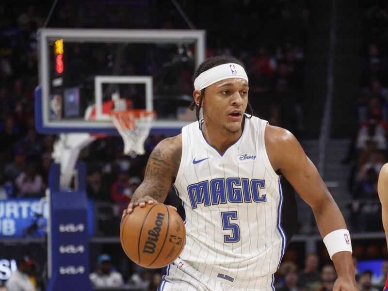 DETROIT, MI - FEBRUARY 24:  Paolo Banchero #5 of the Orlando Magic goes to the basket during the game on February 24, 2024 at Little Caesars Arena in Detroit, Michigan. NOTE TO USER: User expressly acknowledges and agrees that, by downloading and/or using this photograph, User is consenting to the terms and conditions of the Getty Images License Agreement. Mandatory Copyright Notice: Copyright 2024 NBAE (Photo by Brian Sevald/NBAE via Getty Images)