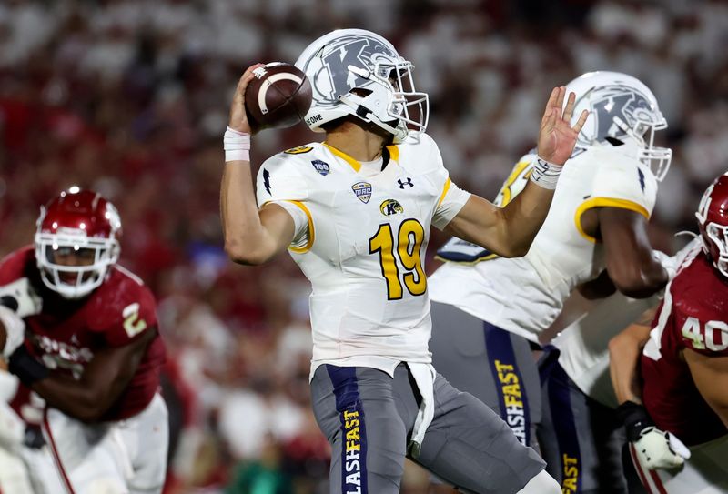 Sep 10, 2022; Norman, Oklahoma, USA; Kent State Golden Flashes quarterback Collin Schlee (19) throws during the second half against the Oklahoma Sooners at Gaylord Family-Oklahoma Memorial Stadium. Mandatory Credit: Kevin Jairaj-USA TODAY Sports