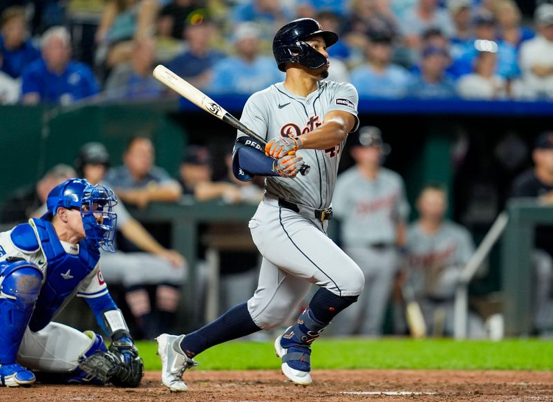 Sep 17, 2024; Kansas City, Missouri, USA; Detroit Tigers right fielder Wenceel Perez (46) hits a double during the ninth inning against the Kansas City Royals at Kauffman Stadium. Mandatory Credit: Jay Biggerstaff-Imagn Images