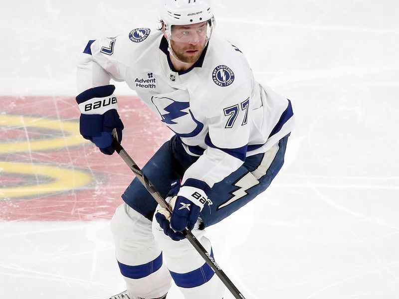 Nov 19, 2024; Pittsburgh, Pennsylvania, USA; Tampa Bay Lightning defenseman Victor Hedman (77) skates with the puck against the Pittsburgh Penguins during the second period at PPG Paints Arena. Mandatory Credit: Charles LeClaire-Imagn Images