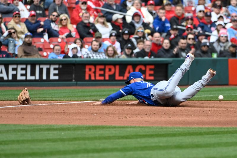 Apr 1, 2023; St. Louis, Missouri, USA; Toronto Blue Jays third baseman Matt Chapman (26) is unable to field a ground ball by the St. Louis Cardinals in the third inning at Busch Stadium. Mandatory Credit: Joe Puetz-USA TODAY Sports