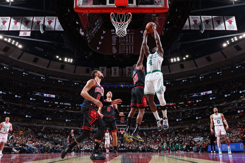 CHICAGO, IL - NOVEMBER 29: Jrue Holiday #4 of the Boston Celtics drives to the basket during the game against the Chicago Bulls during the Emirates NBA Cup game on November 29, 2024 at United Center in Chicago, Illinois. NOTE TO USER: User expressly acknowledges and agrees that, by downloading and or using this photograph, User is consenting to the terms and conditions of the Getty Images License Agreement. Mandatory Copyright Notice: Copyright 2024 NBAE (Photo by Jeff Haynes/NBAE via Getty Images)