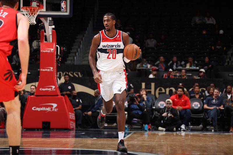 WASHINGTON, DC -? OCTOBER 11: Alexandre Sarr #20 of the Washington Wizards dribbles the ball during the game against the Toronto Raptors during a NBA preseason game on October 11, 2024 at Capital One Arena in Washington, DC. NOTE TO USER: User expressly acknowledges and agrees that, by downloading and or using this Photograph, user is consenting to the terms and conditions of the Getty Images License Agreement. Mandatory Copyright Notice: Copyright 2024 NBAE (Photo by Stephen Gosling/NBAE via Getty Images)