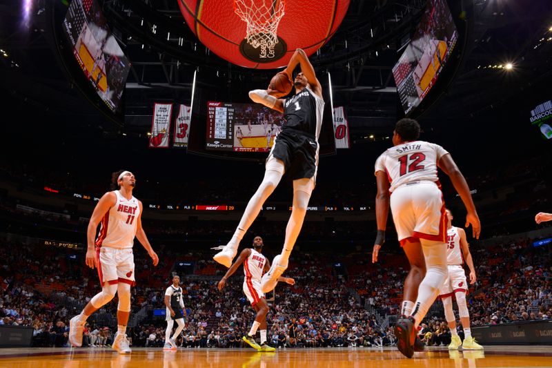 MIAMI, FL - OCTOBER 15: Victor Wembanyama #1 of the San Antonio Spurs handles the ball during the game against the Miami Heat during a NBA preseason game on October 15, 2024 at Kaseya Center in Miami, Florida. NOTE TO USER: User expressly acknowledges and agrees that, by downloading and or using this Photograph, user is consenting to the terms and conditions of the Getty Images License Agreement. Mandatory Copyright Notice: Copyright 2024 NBAE (Photo by Jesse D. Garrabrant/NBAE via Getty Images)