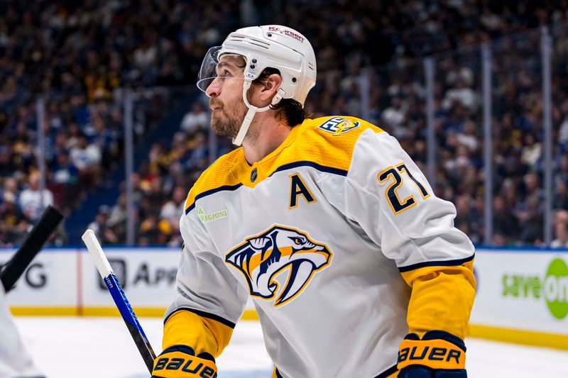 Apr 23, 2024; Vancouver, British Columbia, CAN; Nashville Predators defenseman Ryan McDonagh (27) celebrates a goal scored by forward Colton Sissons (not pictured) against the Vancouver Canucks during the second period in game two of the first round of the 2024 Stanley Cup Playoffs at Rogers Arena. Mandatory Credit: Bob Frid-USA TODAY Sports