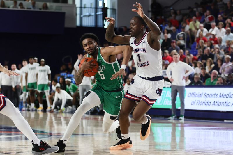 Jan 28, 2024; Boca Raton, Florida, USA; North Texas Mean Green guard Rondel Walker (5) drives to the basket against Florida Atlantic Owls guard Johnell Davis (1) during the first half at Eleanor R. Baldwin Arena. Mandatory Credit: Sam Navarro-USA TODAY Sports