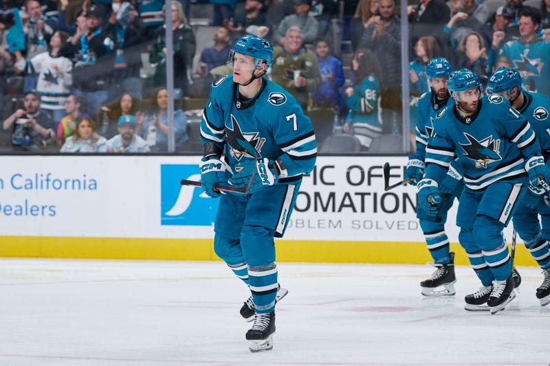 Oct 29, 2022; San Jose, California, USA; San Jose Sharks center Nico Sturm (7) skates to the bench after scoring a goal against the Tampa Bay Lightning during the second period at SAP Center at San Jose. Mandatory Credit: Robert Edwards-USA TODAY Sports