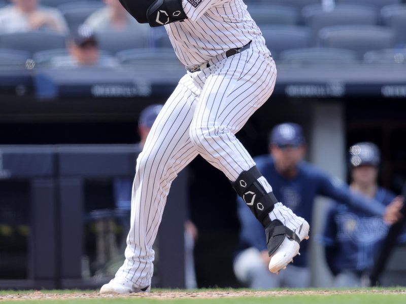 Jul 20, 2024; Bronx, New York, USA; New York Yankees catcher Carlos Narvaez (94) bats against the Tampa Bay Rays in his MLB debut during the ninth inning at Yankee Stadium. Mandatory Credit: Brad Penner-USA TODAY Sports