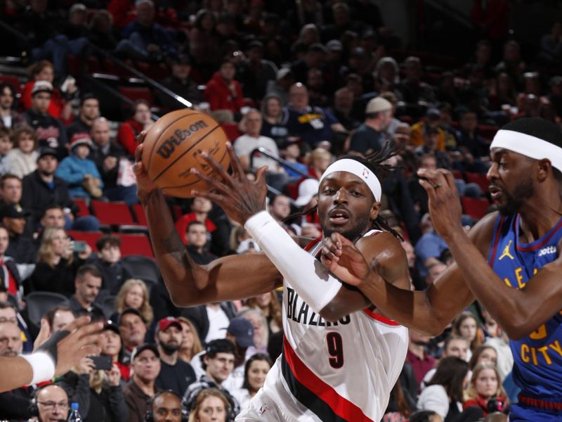 PORTLAND, OR - FEBRUARY 23: Jerami Grant #9 of the Portland Trail Blazers drives to the basket during the game against the Denver Nuggets on February 23, 2024 at the Moda Center Arena in Portland, Oregon. NOTE TO USER: User expressly acknowledges and agrees that, by downloading and or using this photograph, user is consenting to the terms and conditions of the Getty Images License Agreement. Mandatory Copyright Notice: Copyright 2024 NBAE (Photo by Cameron Browne/NBAE via Getty Images)