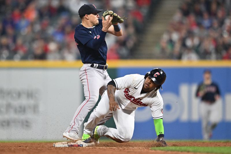 Jun 6, 2023; Cleveland, Ohio, USA; Cleveland Guardians third baseman Jose Ramirez (11) is forced out by Boston Red Sox shortstop Enrique Hernandez (5) during the eighth inning at Progressive Field. Mandatory Credit: Ken Blaze-USA TODAY Sports