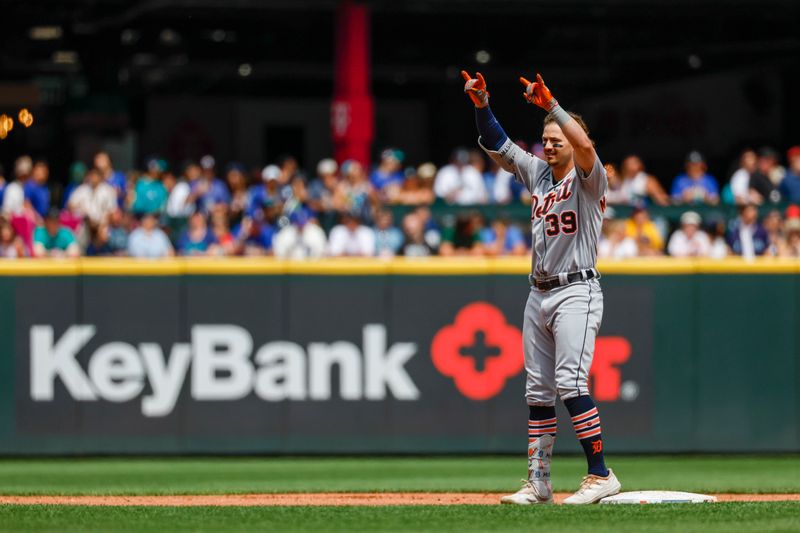 Jul 16, 2023; Seattle, Washington, USA; Detroit Tigers left fielder Zach McKinstry (39) reacts towards the dugout after hitting a double against the Seattle Mariners during the third inning at T-Mobile Park. Mandatory Credit: Joe Nicholson-USA TODAY Sports