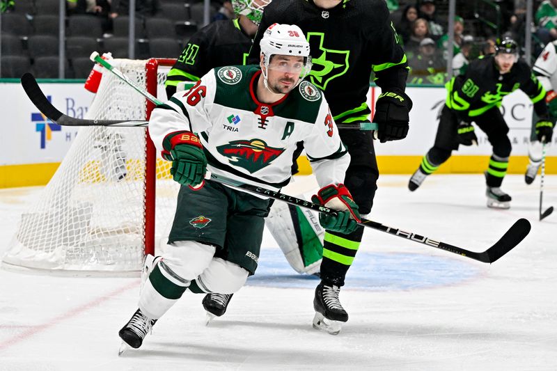 Jan 10, 2024; Dallas, Texas, USA; Minnesota Wild right wing Mats Zuccarello (36) chases the puck during the first period against the Dallas Stars at the American Airlines Center. Mandatory Credit: Jerome Miron-USA TODAY Sports