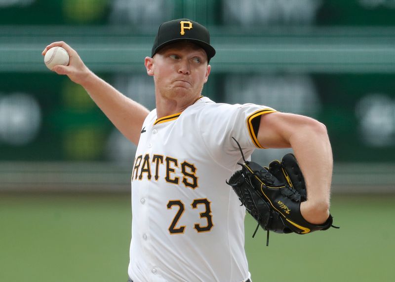 Sep 26, 2024; Pittsburgh, Pennsylvania, USA; Pittsburgh Pirates starting pitcher Mitch Keller (23) delivers a pitch  against the Milwaukee Brewers during the first inning at PNC Park. Mandatory Credit: Charles LeClaire-Imagn Images