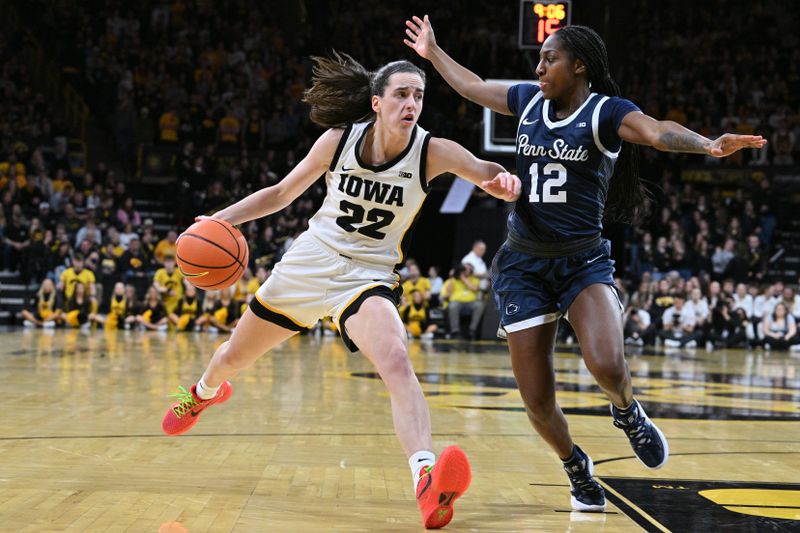 Feb 8, 2024; Iowa City, Iowa, USA; Iowa Hawkeyes guard Caitlin Clark (22) goes to the basket as Penn State Nittany Lions guard Jayla Oden (12) defends during the second half at Carver-Hawkeye Arena. Mandatory Credit: Jeffrey Becker-USA TODAY Sports