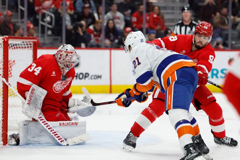 Feb 29, 2024; Detroit, Michigan, USA;  Detroit Red Wings goaltender Alex Lyon (34) makes a save on New York Islanders center Kyle Palmieri (21) in the third period at Little Caesars Arena. Mandatory Credit: Rick Osentoski-USA TODAY Sports