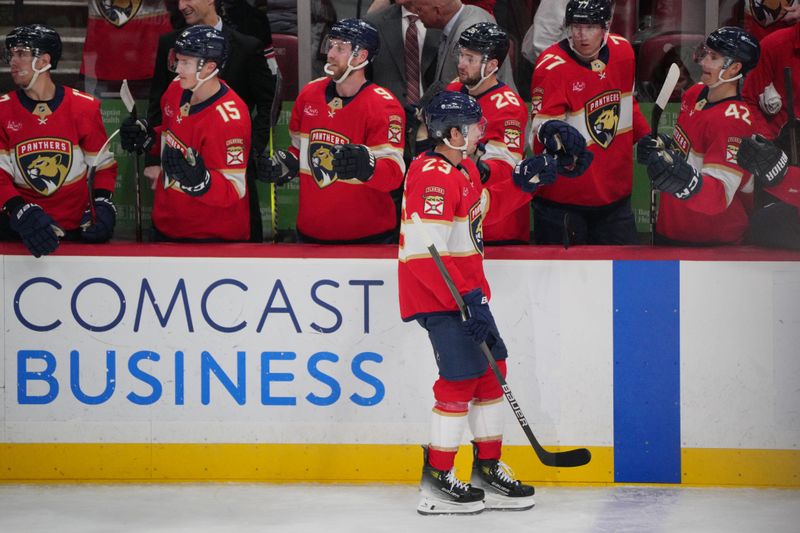 Feb 1, 2025; Sunrise, Florida, USA; Florida Panthers center Carter Verhaeghe (23) celebrates a goal against the Chicago Blackhawks in the third period at Amerant Bank Arena. Mandatory Credit: Jim Rassol-Imagn Images