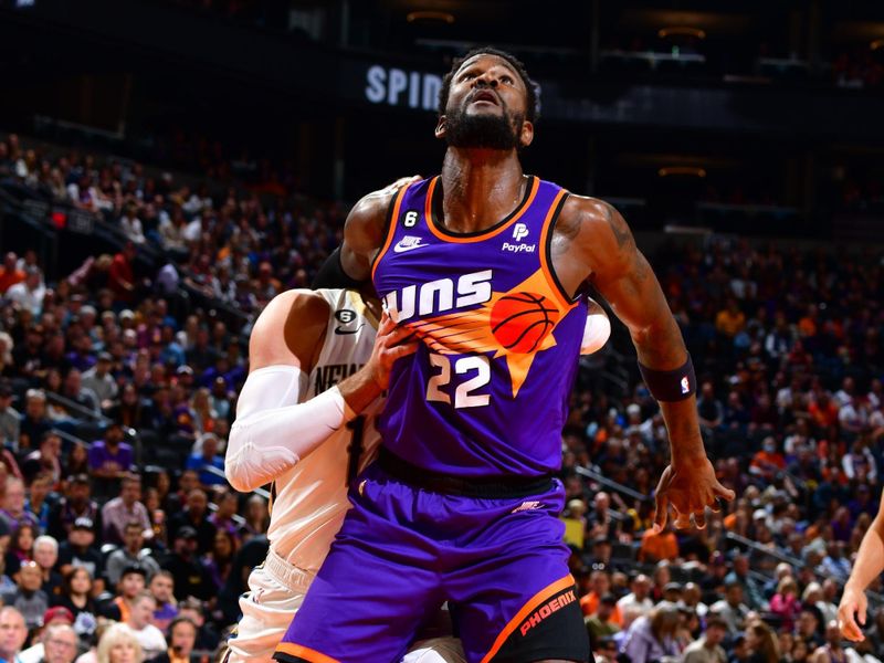 PHOENIX, AZ - OCTOBER 28: Deandre Ayton #22 of the Phoenix Suns boxes out during the game against the New Orleans Pelicans on October 28, 2022 at Footprint Center in Phoenix, Arizona. NOTE TO USER: User expressly acknowledges and agrees that, by downloading and or using this photograph, user is consenting to the terms and conditions of the Getty Images License Agreement. Mandatory Copyright Notice: Copyright 2022 NBAE (Photo by Barry Gossage/NBAE via Getty Images)