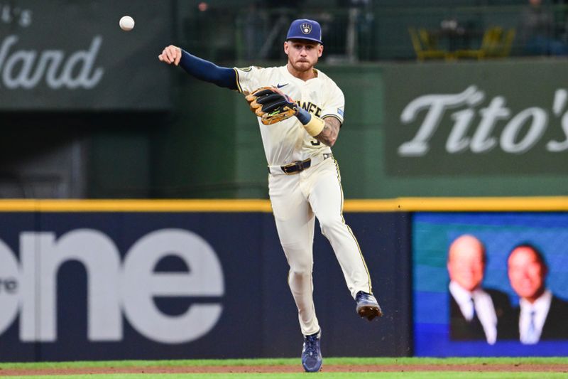 May 7, 2025; Milwaukee, Wisconsin, USA; Milwaukee Brewers shortstop Joseph Ortiz (3) throws out Houston Astros shortstop Jeremy Pena (not pictured) in the third inning at American Family Field. Mandatory Credit: Benny Sieu-Imagn Images