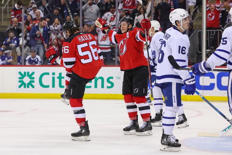 Mar 7, 2023; Newark, New Jersey, USA; New Jersey Devils left wing Erik Haula (56) celebrates his goal against the Toronto Maple Leafs during the second period at Prudential Center. Mandatory Credit: Ed Mulholland-USA TODAY Sports