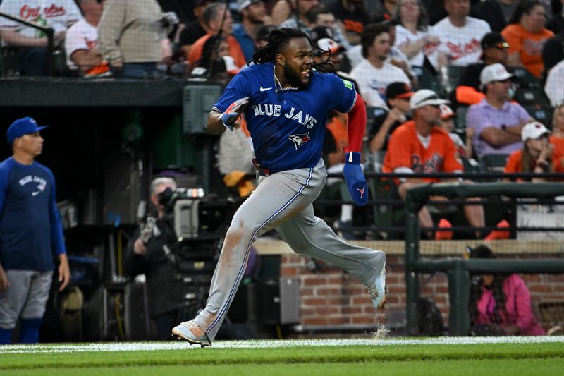 May 13, 2024; Baltimore, Maryland, USA;  Toronto Blue Jays first baseman Vladimir Guerrero Jr. (27) rounds third base to score on T designated hitter Daniel Vogelbach (20) sixth inning single against the Baltimore Orioles at Oriole Park at Camden Yards. Mandatory Credit: Tommy Gilligan-USA TODAY Sports