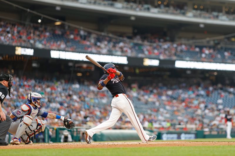 Jun 4, 2024; Washington, District of Columbia, USA; Washington Nationals shortstop CJ Abrams (5) singles against the New York Mets during the third inning at Nationals Park. Mandatory Credit: Geoff Burke-USA TODAY Sports