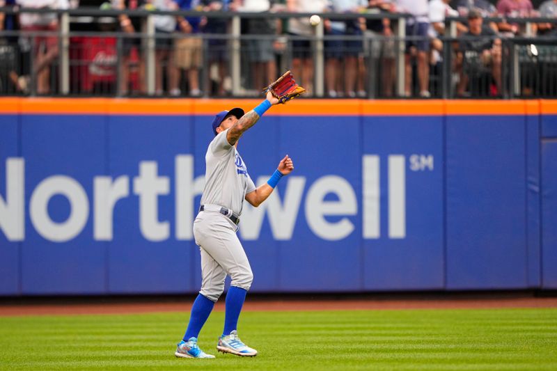 Jul 16, 2023; New York City, New York, USA; Los Angeles Dodgers left fielder David Peralta (6) catches a fly ball hit by New York Mets designated hitter Daniel Vogelbach (not pictured) during the second inning at Citi Field. Mandatory Credit: Gregory Fisher-USA TODAY Sports