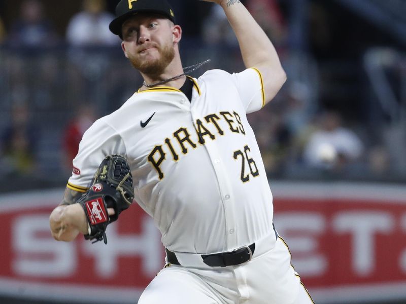 Aug 6, 2024; Pittsburgh, Pennsylvania, USA;  Pittsburgh Pirates starting pitcher Bailey Falter (26) delivers a pitch against the San Diego Padres during the first inning at PNC Park. Mandatory Credit: Charles LeClaire-USA TODAY Sports