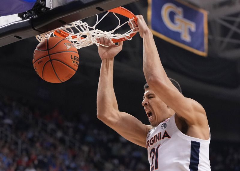 Mar 9, 2023; Greensboro, NC, USA; Virginia Cavaliers forward Kadin Shedrick (21) scores in the second half of the quarterfinals of the ACC tournament at Greensboro Coliseum.  Mandatory Credit: Bob Donnan-USA TODAY Sports