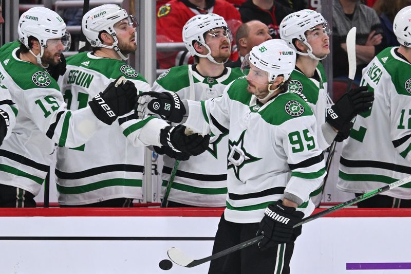 Jan 13, 2024; Chicago, Illinois, USA;  Dallas Stars forward Matt Duchene (95) celebrates with the bench after scoring a power play goal in the third period against the Chicago Blackhawks at United Center. Mandatory Credit: Jamie Sabau-USA TODAY Sports