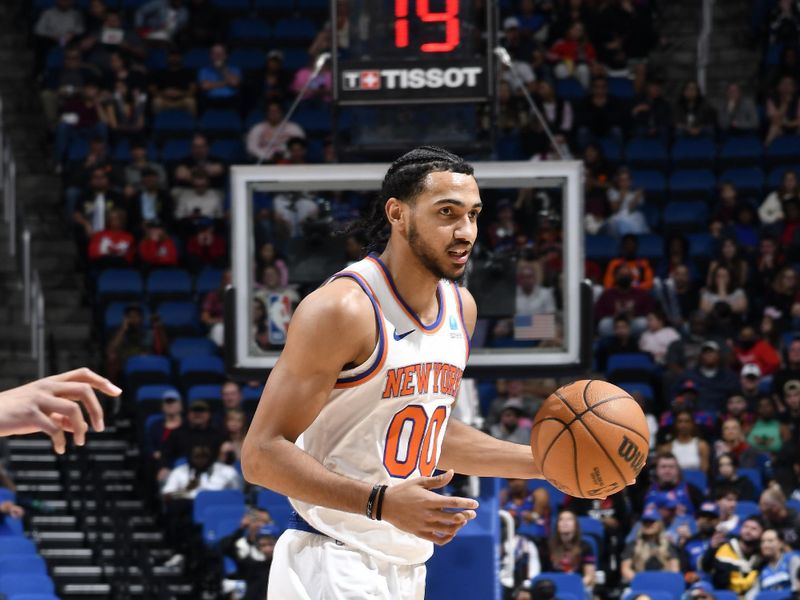 ORLANDO, FL - FEBRUARY 14: Jacob Toppin #00 of the New York Knicks dribbles the ball during the game against the Orlando Magic on February 14, 2024 at the Kia Center in Orlando, Florida. NOTE TO USER: User expressly acknowledges and agrees that, by downloading and or using this photograph, User is consenting to the terms and conditions of the Getty Images License Agreement. Mandatory Copyright Notice: Copyright 2024 NBAE (Photo by Fernando Medina/NBAE via Getty Images)