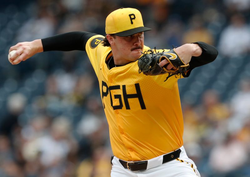 Aug 16, 2024; Pittsburgh, Pennsylvania, USA;  Pittsburgh Pirates starting pitcher Paul Skenes (30) delivers a pitch against the Seattle Mariners during the first inning at PNC Park. Mandatory Credit: Charles LeClaire-USA TODAY Sports