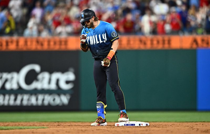 Jun 21, 2024; Philadelphia, Pennsylvania, USA; Philadelphia Phillies first baseman Bryce Harper (3) reacts after hitting a double against the Arizona Diamondbacks in the sixth inning at Citizens Bank Park. Mandatory Credit: Kyle Ross-USA TODAY Sports