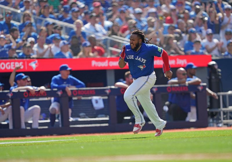 May 20, 2024; Toronto, Ontario, CAN; Toronto Blue Jays first base Vladimir Guerrero Jr. (27) runs for home plate scoring a run against the Chicago White Sox during the sixth inning at Rogers Centre. Mandatory Credit: Nick Turchiaro-USA TODAY Sports