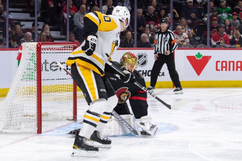 Mar 12, 2024; Ottawa, Ontario, CAN; Ottawa Senators goalie Joonas Korpisalo (70) makes a save in front of Pittsburgh Penguins left wing Drew O'Connor (10) in the second period at the Canadian Tire Centre. Mandatory Credit: Marc DesRosiers-USA TODAY Sports