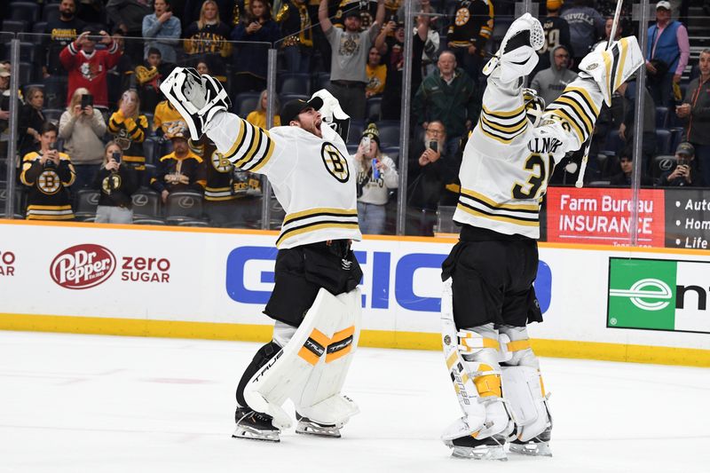 Apr 2, 2024; Nashville, Tennessee, USA; Boston Bruins goaltender Linus Ullmark (35) celebrates with goaltender Jeremy Swayman (1) after a win against the Nashville Predators at Bridgestone Arena. Mandatory Credit: Christopher Hanewinckel-USA TODAY Sports