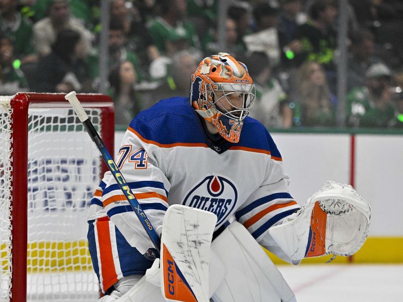 May 23, 2024; Dallas, Texas, USA; Edmonton Oilers goaltender Stuart Skinner (74) faces the Dallas Stars attack during the second period in game one of the Western Conference Final of the 2024 Stanley Cup Playoffs at American Airlines Center. Mandatory Credit: Jerome Miron-USA TODAY Sports