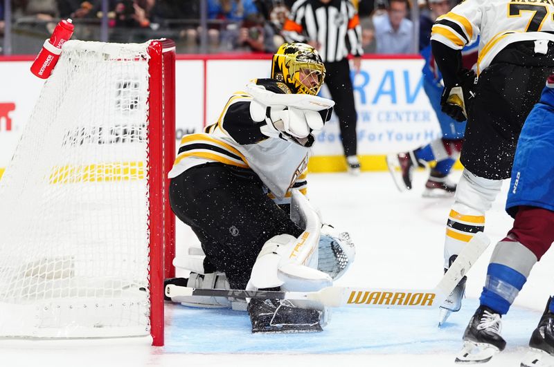 Oct 16, 2024; Denver, Colorado, USA; Boston Bruins goaltender Joonas Korpisalo (70) loses his stick in the second period against the Colorado Avalanche at Ball Arena. Mandatory Credit: Ron Chenoy-Imagn Images