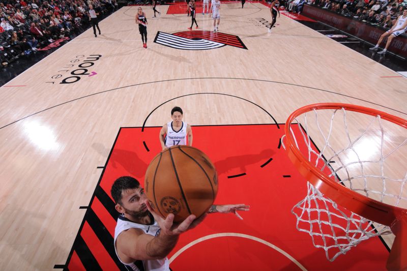 PORTLAND, OR - NOVEMBER 10: John Konchar #46 of the Memphis Grizzlies shoots the ball during the game against the Portland Trail Blazers on November 10, 2024 at the Moda Center Arena in Portland, Oregon. NOTE TO USER: User expressly acknowledges and agrees that, by downloading and or using this photograph, user is consenting to the terms and conditions of the Getty Images License Agreement. Mandatory Copyright Notice: Copyright 2024 NBAE (Photo by Cameron Browne/NBAE via Getty Images)