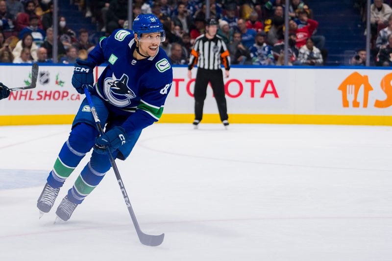 Dec 14, 2023; Vancouver, British Columbia, CAN; Vancouver Canucks forward Dakota Joshua (81) skates against the Florida Panthers in the third period at Rogers Arena. Vancouver won 4-0. Mandatory Credit: Bob Frid-USA TODAY Sports