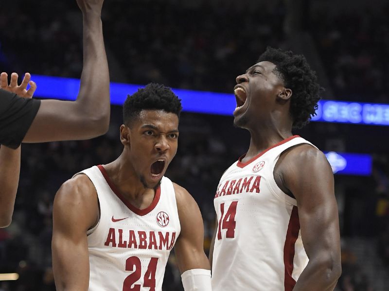 Mar 11, 2023; Nashville, TN, USA;  Alabama Crimson Tide forward Noah Gurley (4) and center Charles Bediako (14) celebrates after center Charles Bediako (14) makes a basket and gets the plus one during the second half at Bridgestone Arena. Mandatory Credit: Steve Roberts-USA TODAY Sports