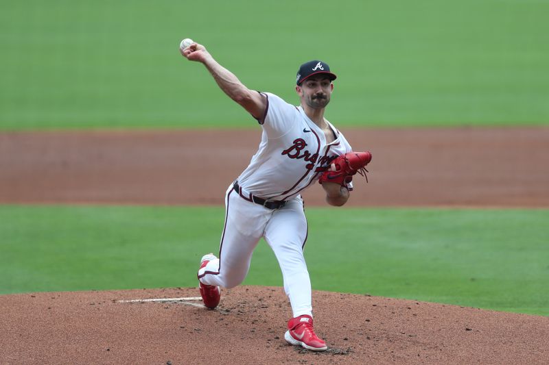 Jun 29, 2025; Cumberland, Georgia, USA; Atlanta Braves starting pitcher Spencer Strider (99) pitches during a game against the Philadelphia Phillies during the first inning at Truist Park. Mandatory Credit: Mady Mertens-Imagn Images